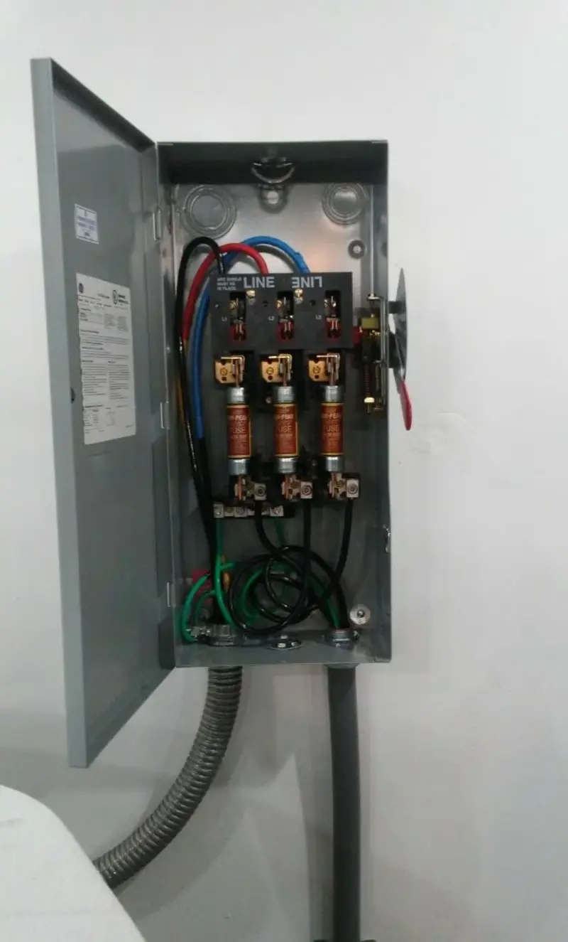 Three-phase disconnect switch installed for Smoke Detector Installation in Mancelona