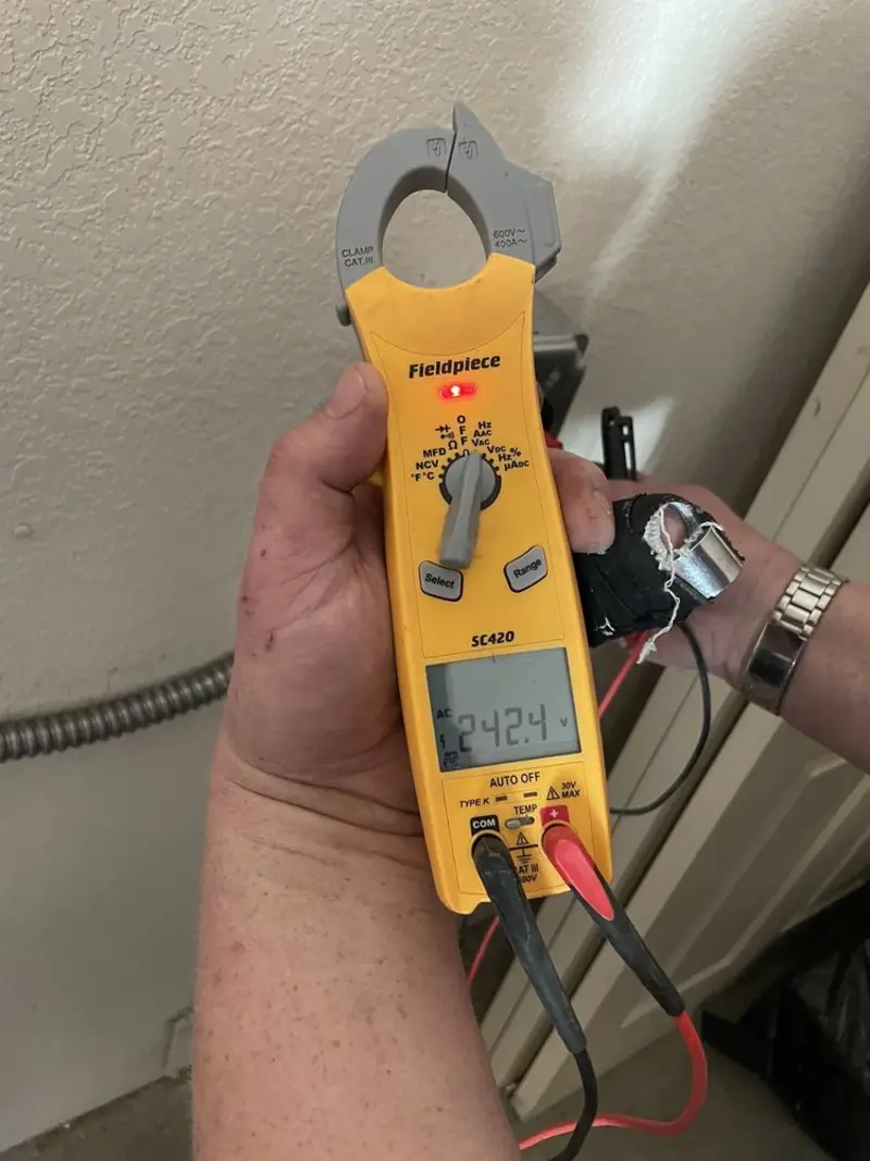 Voltage testing with clamp meter during Generator Installation in Mancelona